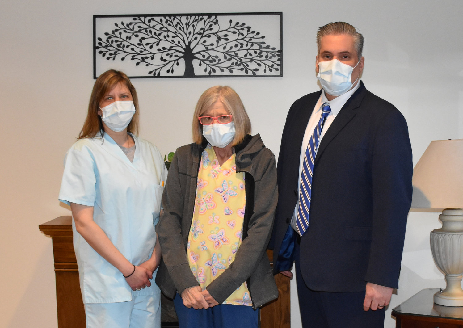 Wayne Woodlands Manor Employee of the Year 2020 Kathy Piorkowski, RN, is flanked by director of nursing Kelly Miller, RN, left, and Wayne Woodlands Administrator Michael Freund.
